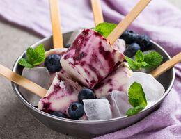 Frozen fruit sorbet on a stick.